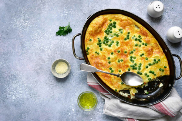 Clafoutis de petits pois, jambon et Kiri : Un repas convivial et réconfortant